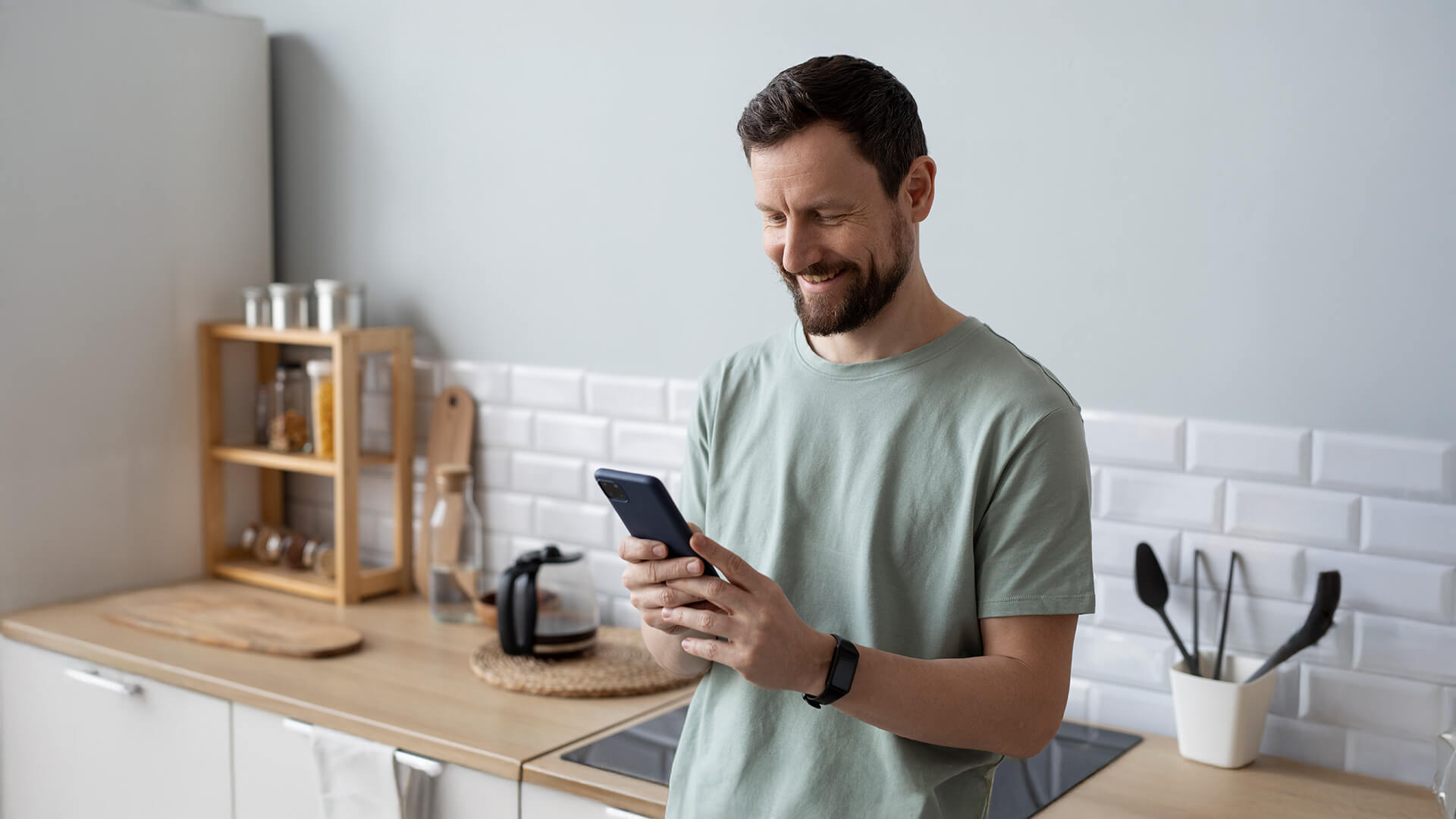 Man with a cellphone in hands using LTS App