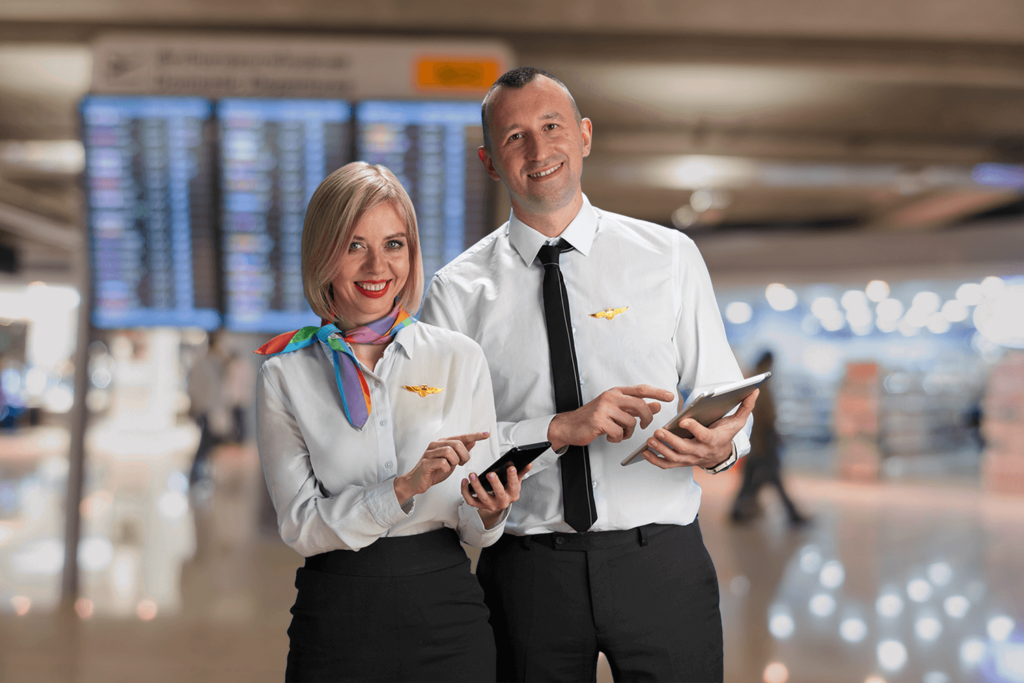 Cabin Crew reviewing the itinerary though smathphones